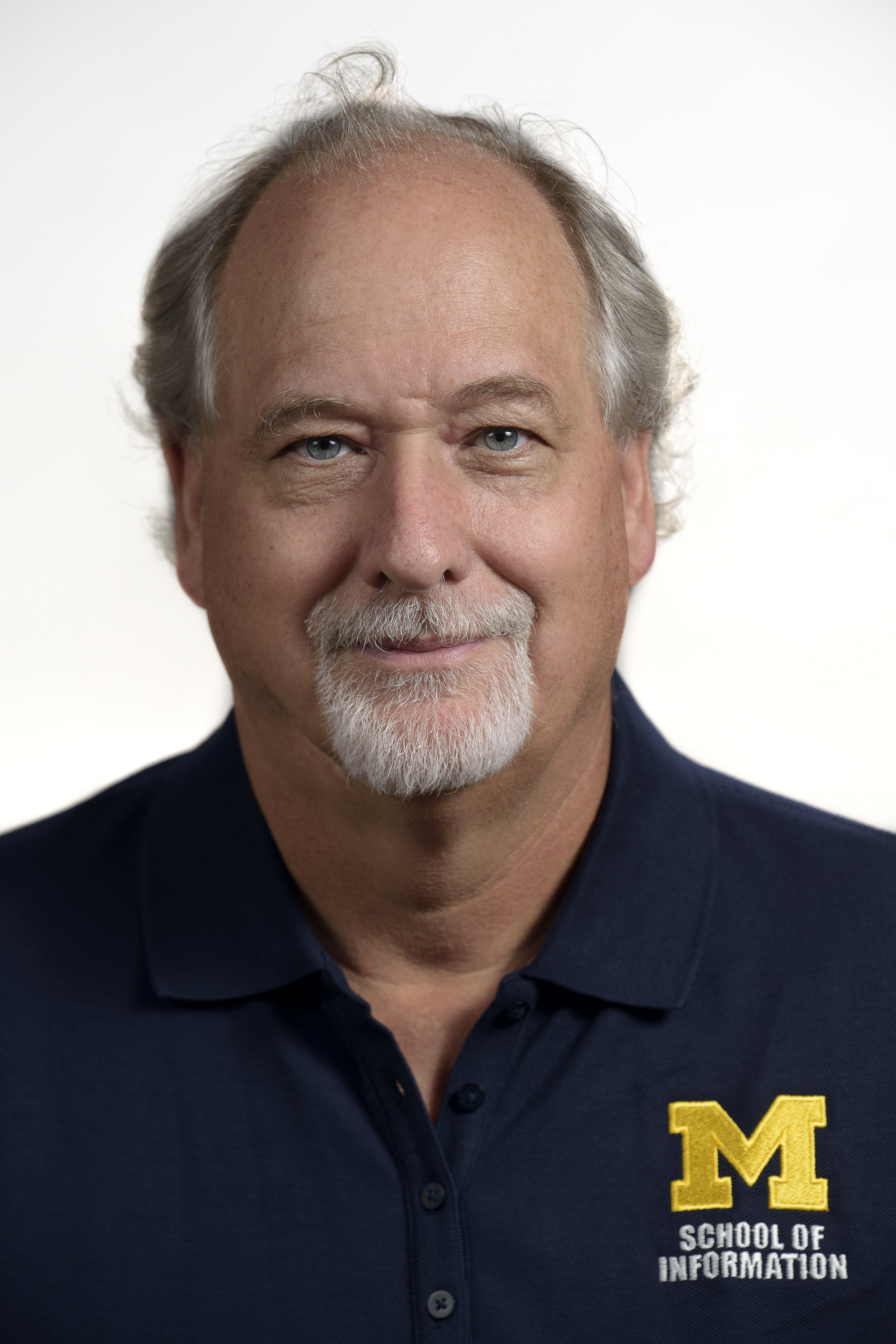 Dr. Chuck Picture with UMSI shirt